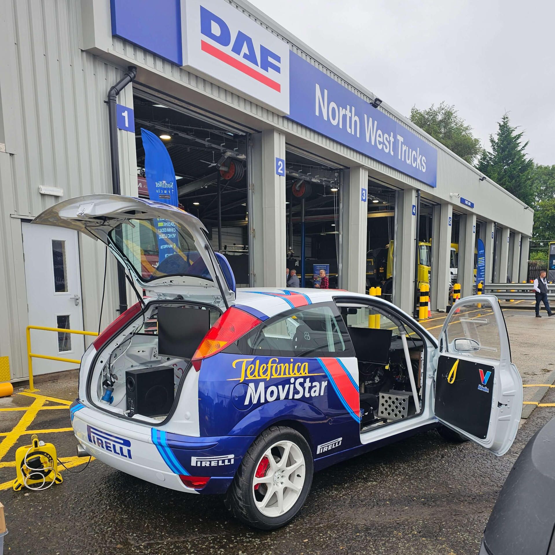 Racing simulator infront of north west trucks